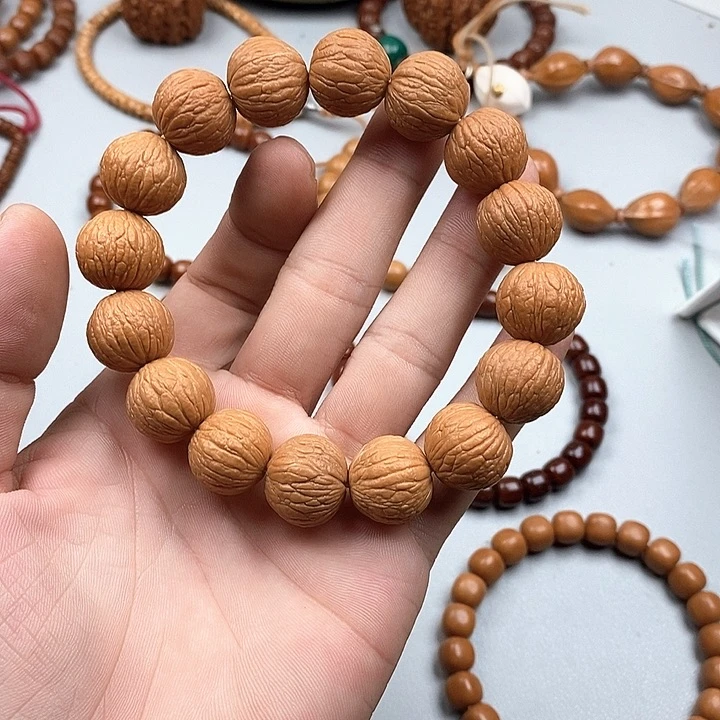 好***）猴头核桃吊坠福袋手串