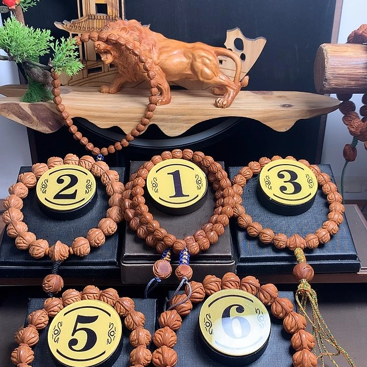 桃核吊坠观* 三通桃核手串