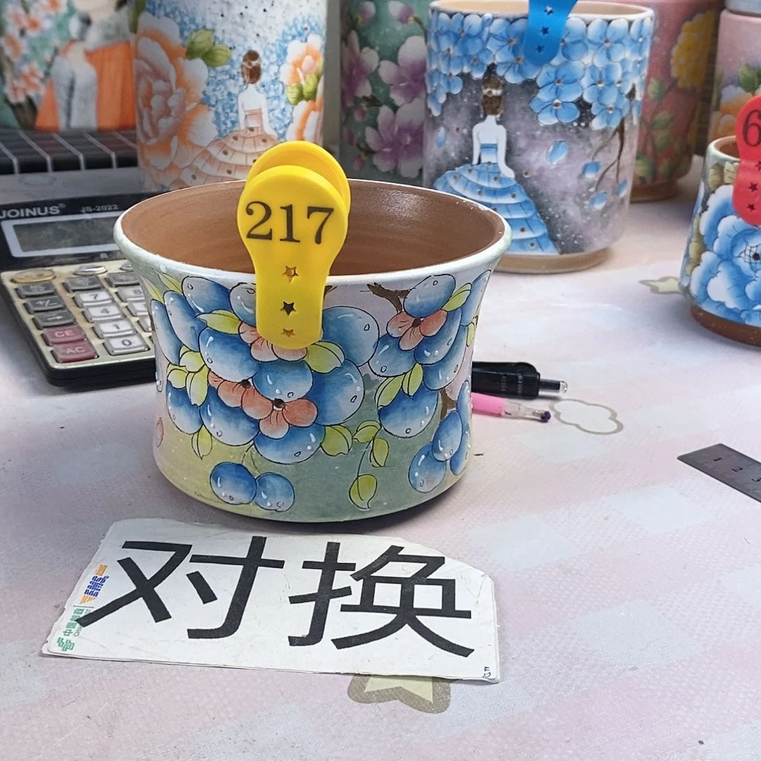 紫砂花盆菩**后红陶手绘花盆