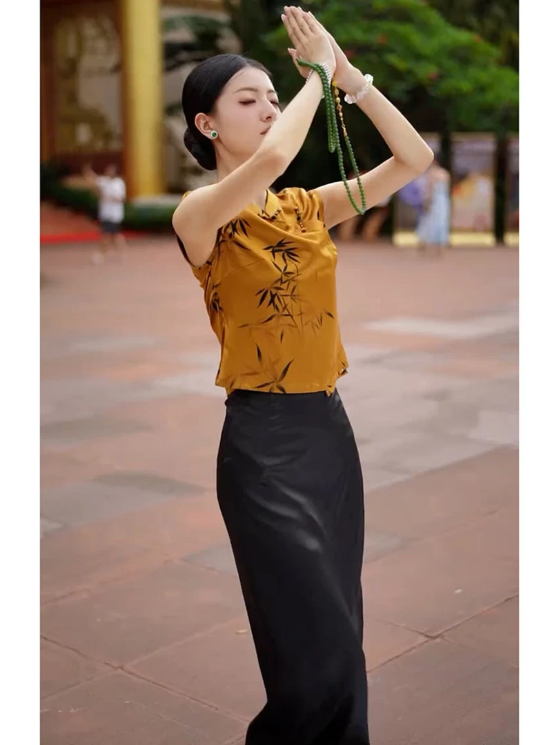 今年流行新中式国风茶里茶气别致上衣轻奢高级感黄色印花衬衫女秋