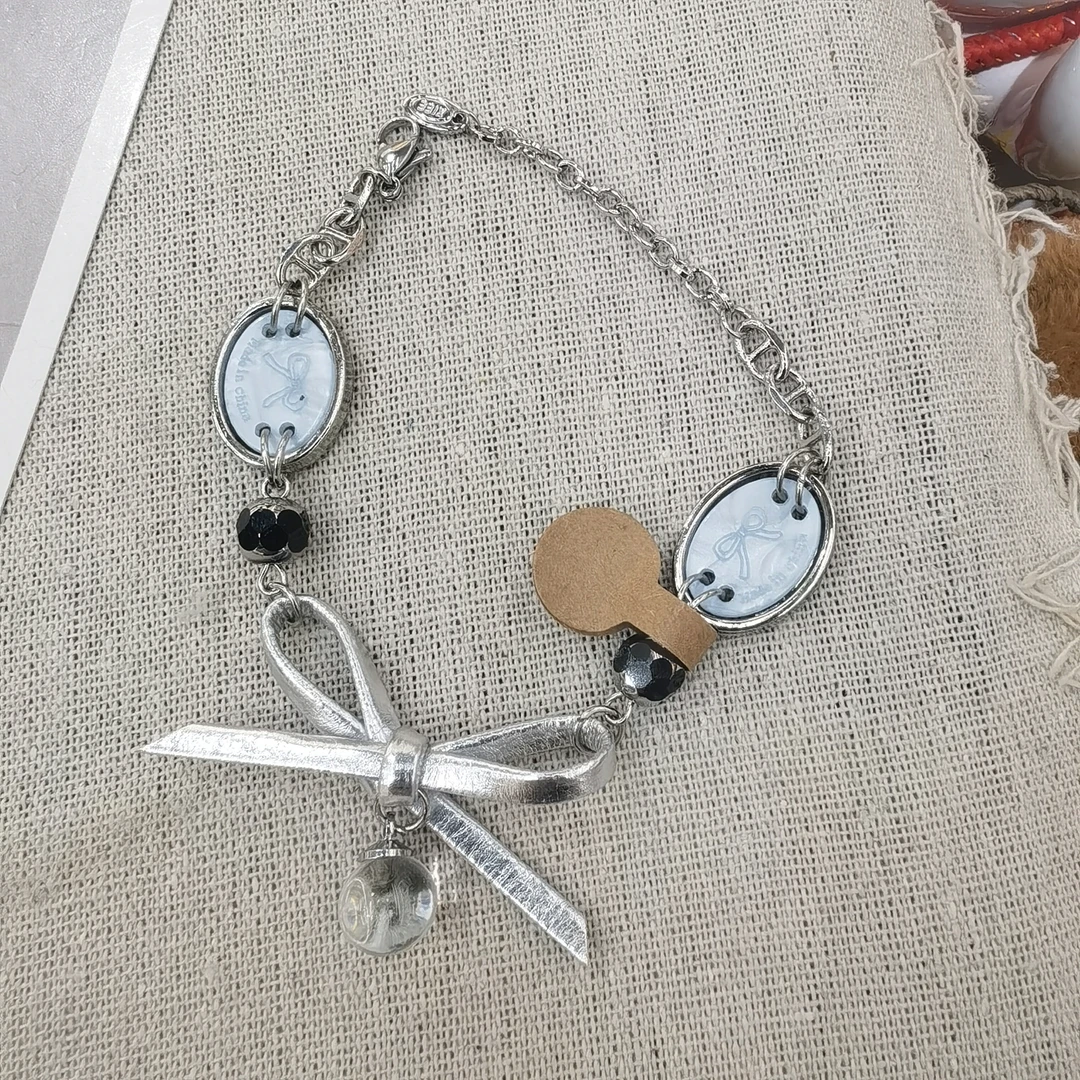 D557银色蓝色蝴蝶结手链