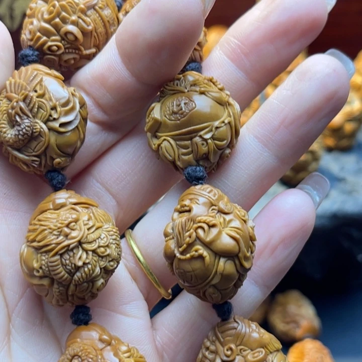 大***河橄榄核吊坠瑞兽财神
