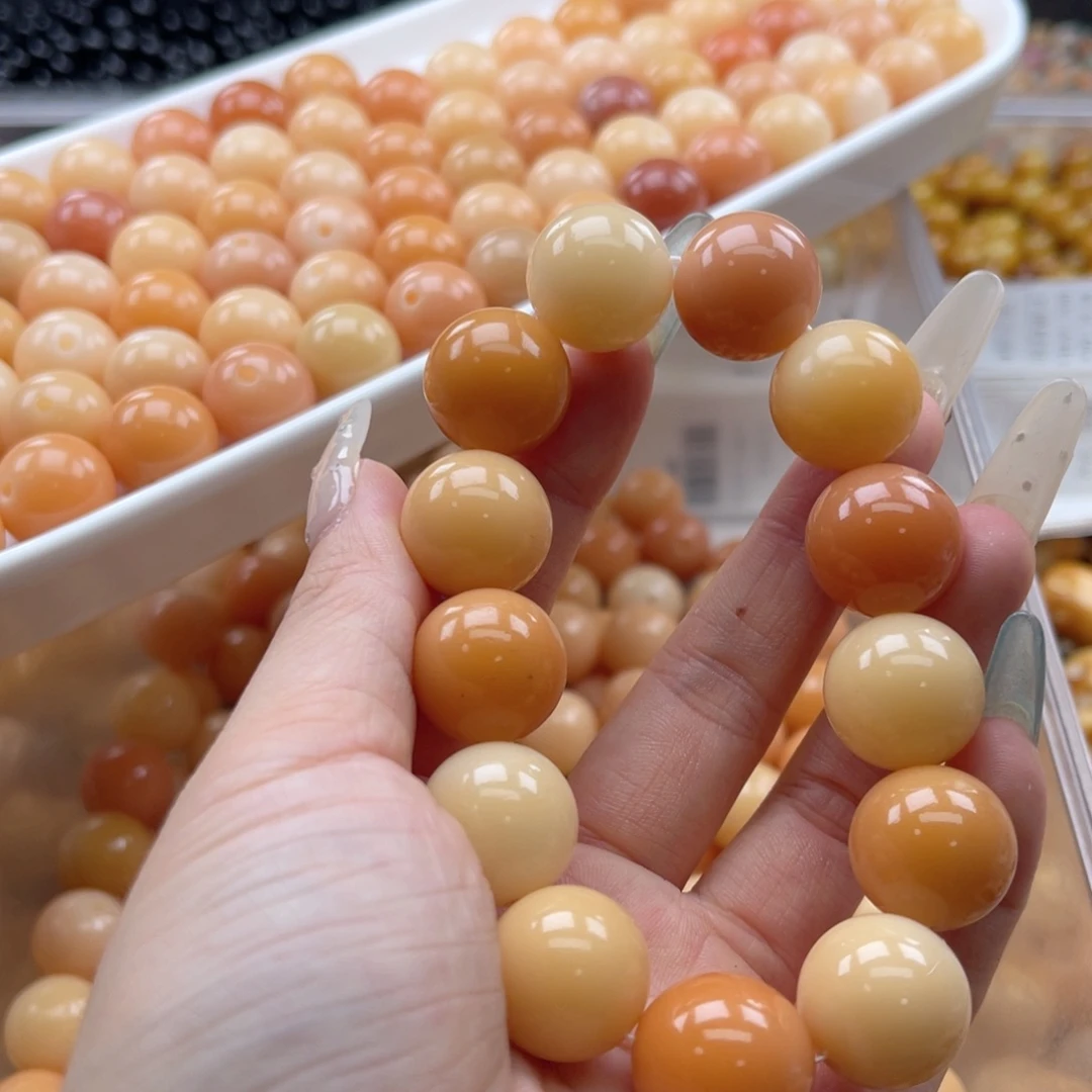 白玉菩提吊坠q17mm/15颗暖橘