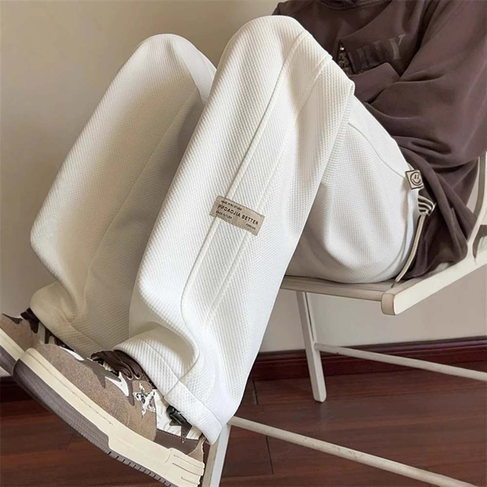 仓石一树潮牌休闲裤子男宽松春秋新款抽绳运动裤青年轻奢痞帅男装