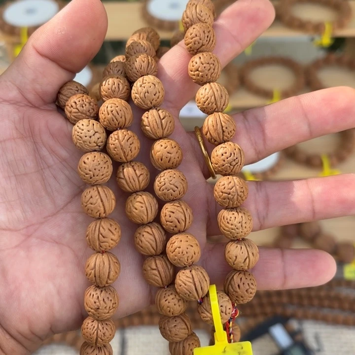 I***3非金属木质野生桃核手持