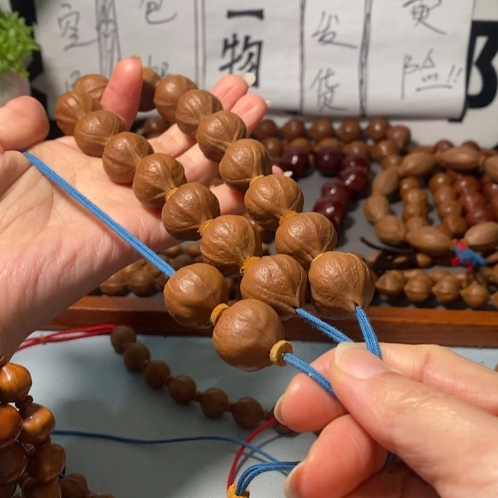 橄榄核手串0291精品蒜头铁核18颗+3通