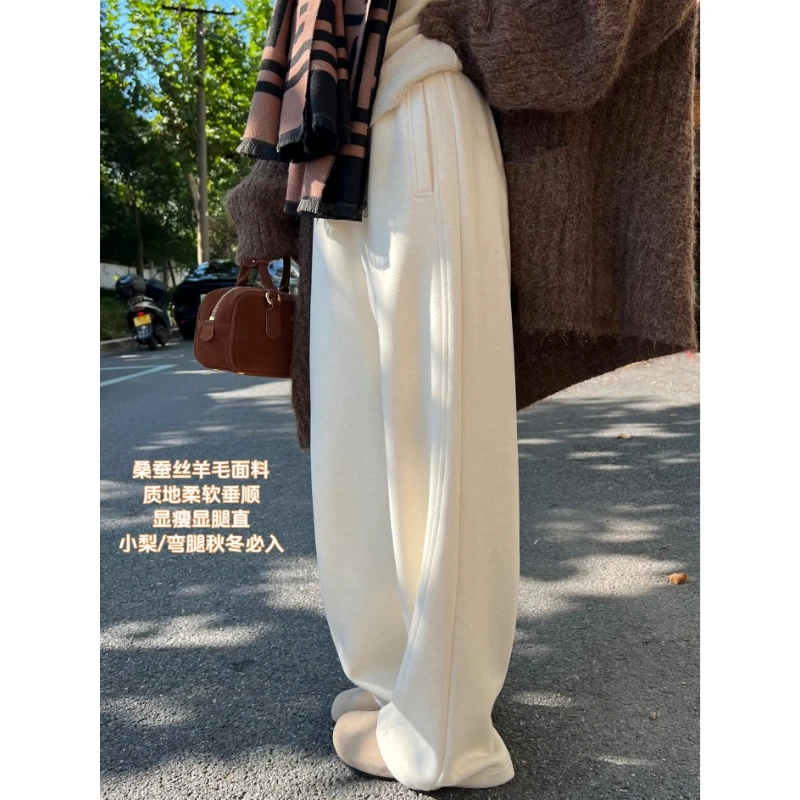 白色弯刀裤女2025秋冬新款直筒休闲运动香蕉卫裤加绒阔腿糯米裤子
