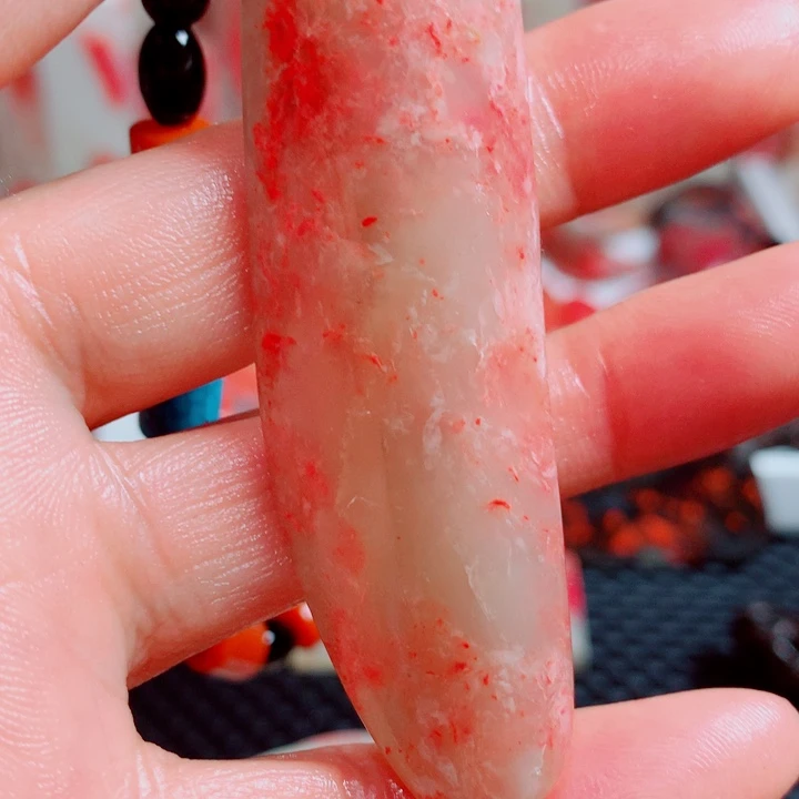 8***9巴林石巴林鸡血手把件