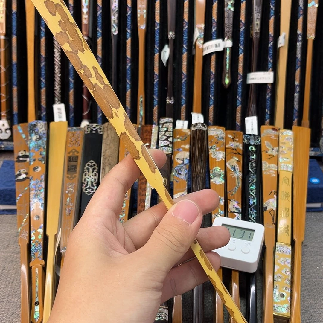 扇子忘***何纯手工制作的