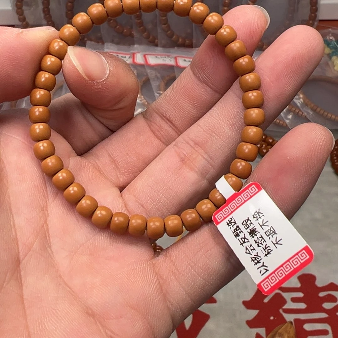 杨***⠀吊坠橄榄核老挝核尖单圈5.8mm