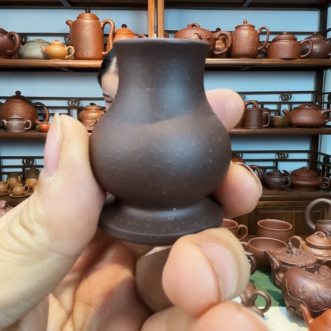 紫砂茶杯聚财宝瓶盖置