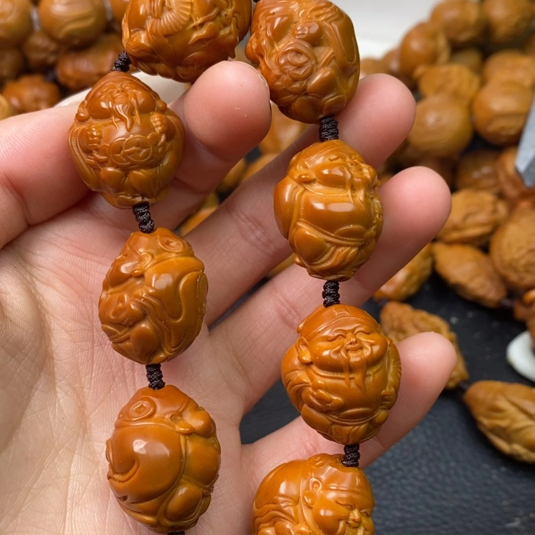 橄榄核吊坠ଲ****介橄榄核八方来财