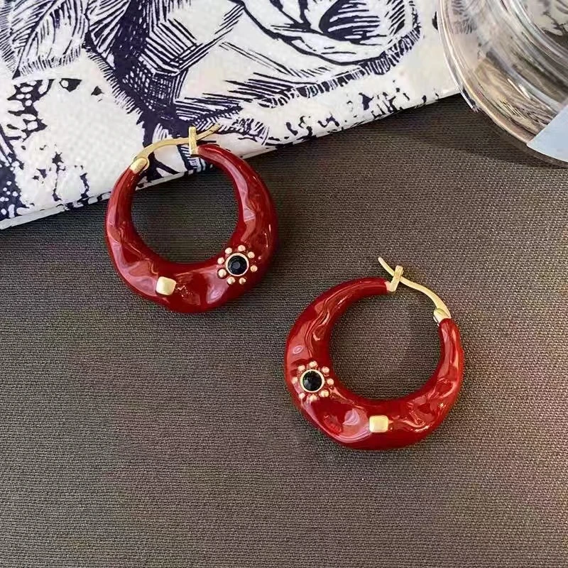 925银耳饰 高级安克拉红不规则太阳图腾耳扣