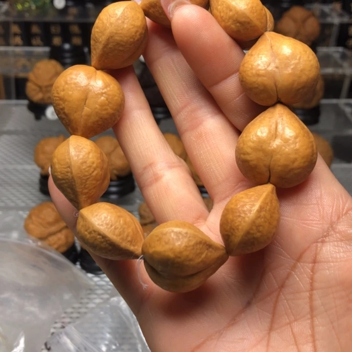 橄榄核把件?****闹88小心心