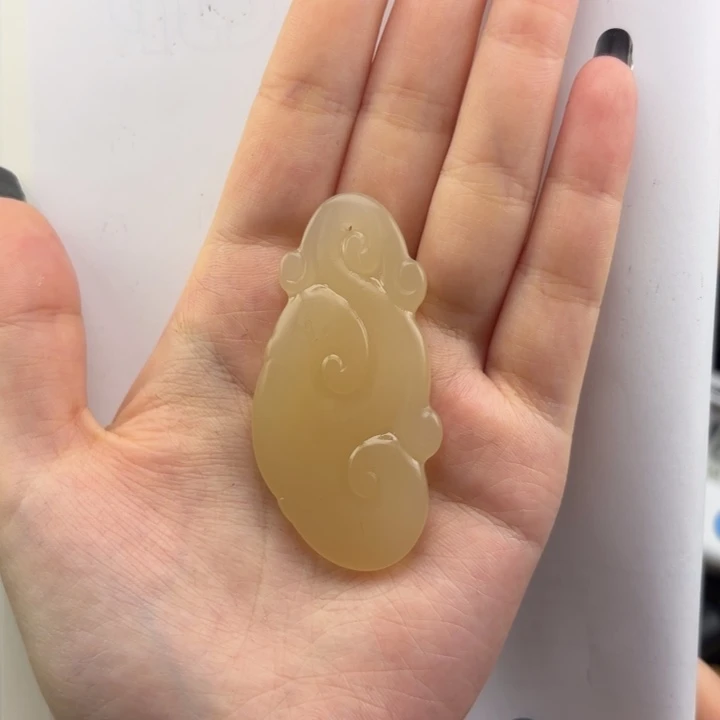 户***狼石英质玉黄蜡石挂件未镶嵌