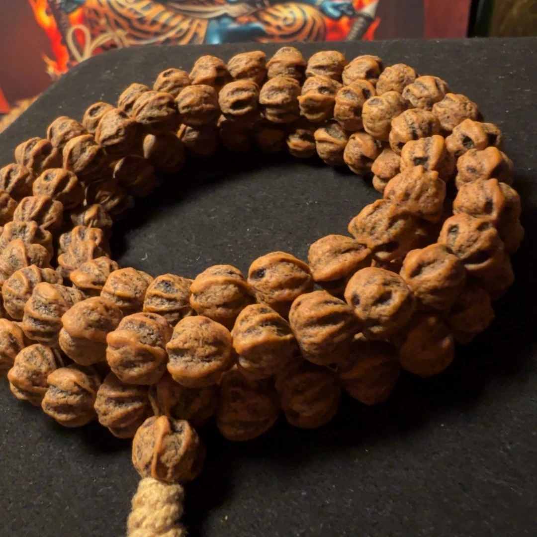 贫***孩柏香籽/百香籽吊坠