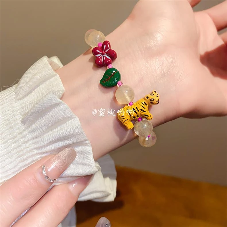 合金仿水晶手链 水晶花朵小老虎串珠手链可爱甜美手串小众手饰