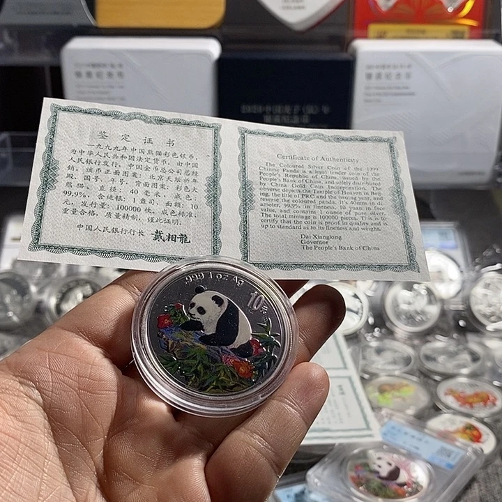 纯银99年彩猫带证书一枚如图
