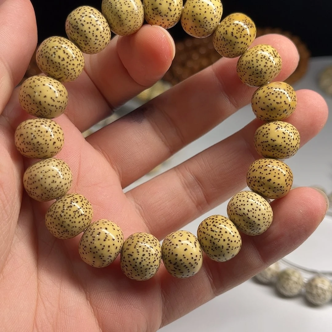 星月菩提吊坠14/12藏桶珠鸡油黄