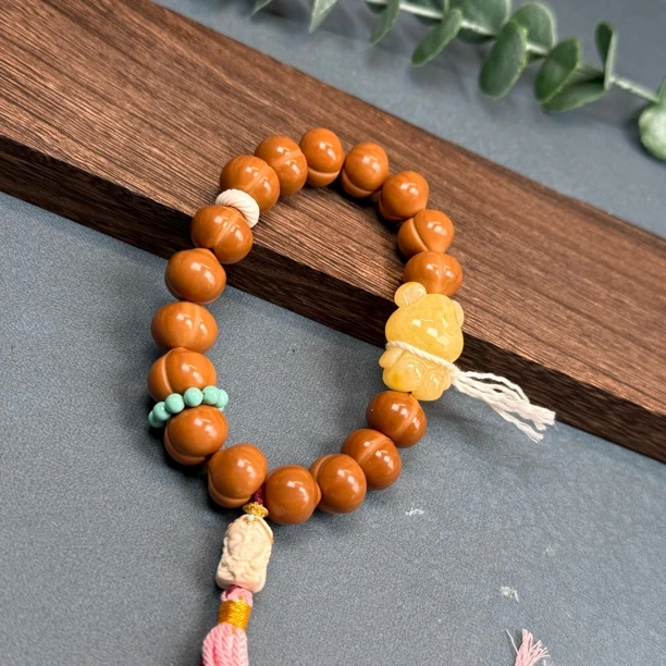 Q41-33猴头屁桃手持  设计款手持 约16mm