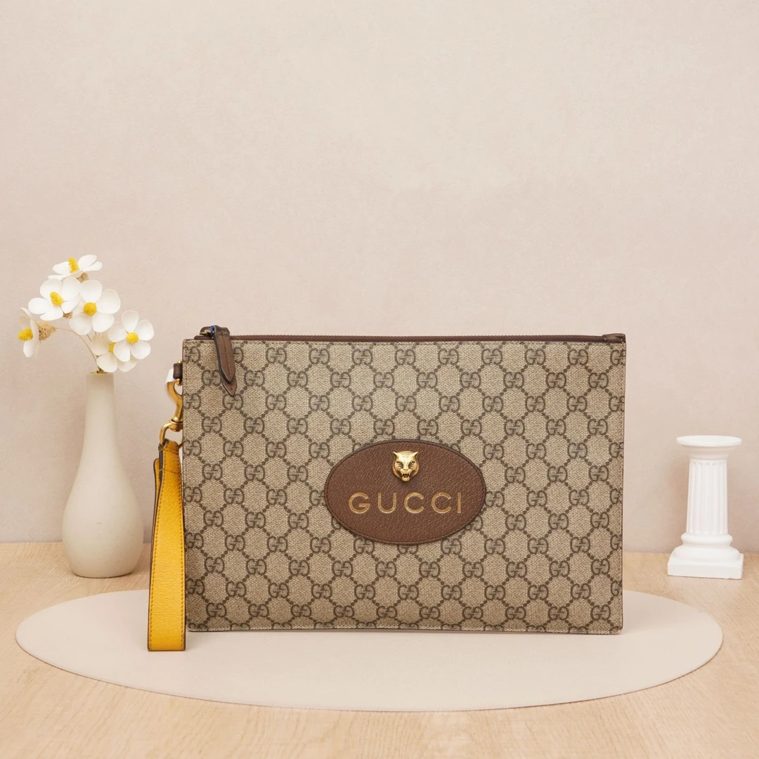 95新 GUCCI/古驰 虎头手拿包老花/手腕带/DS023259