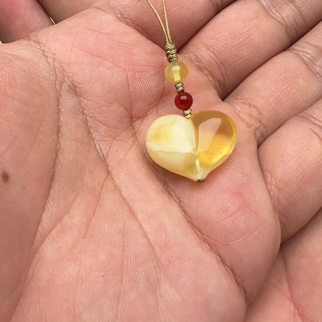 珊***）琥珀未镶嵌裸石屁桃手机绳