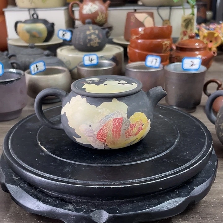 I***妍建水紫陶刻填重工壶
