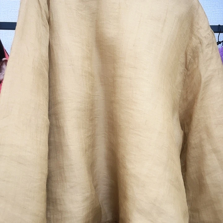 柯***冉木耳边黄色棉服不退换