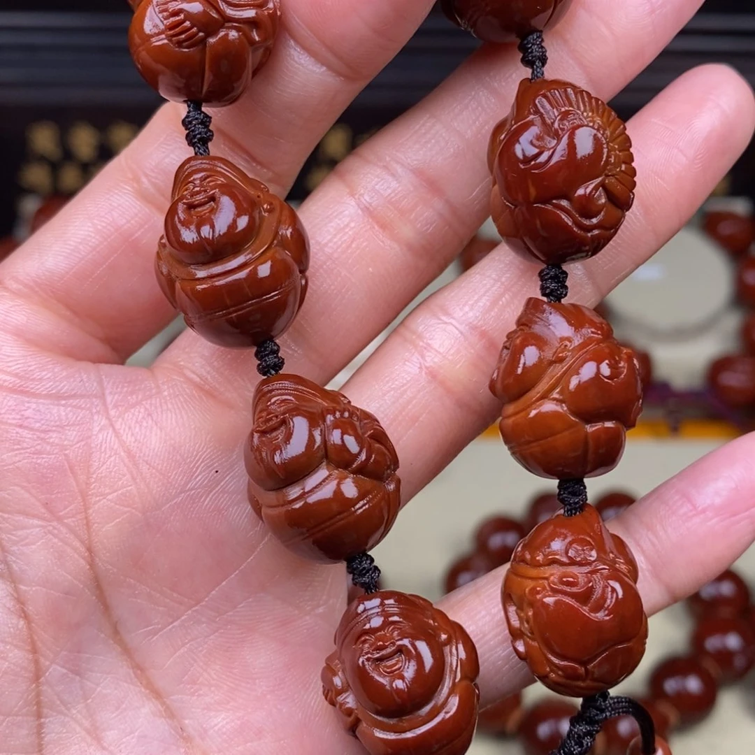 史***旭橄榄核吊坠八宝财神