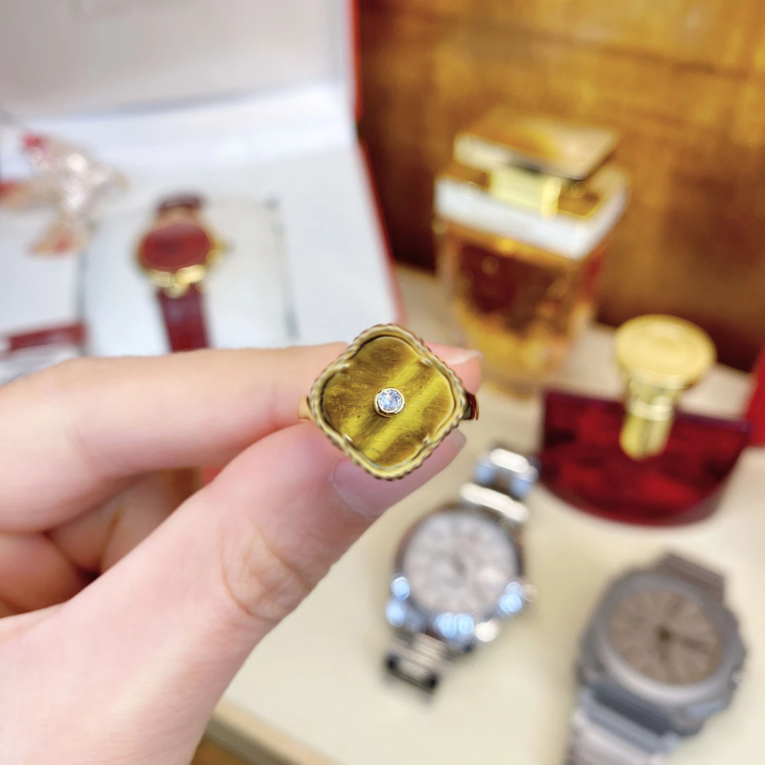 925银合成锆石戒指 黑标K虎眼色四朵花百搭戒指dois12