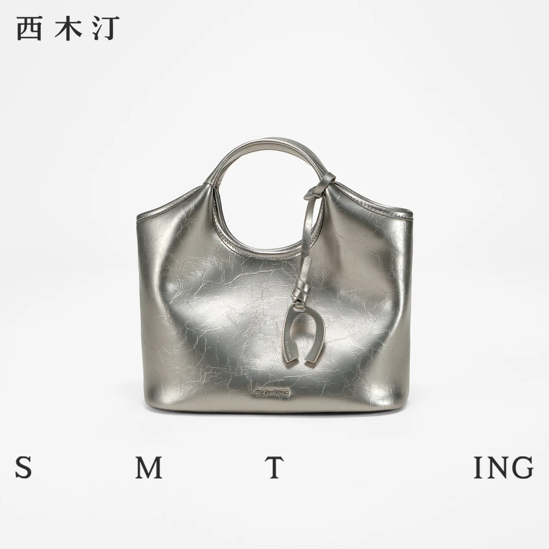 西木汀【佟晨洁同款】赴约 水桶新款小众手提菜篮子腋下包包