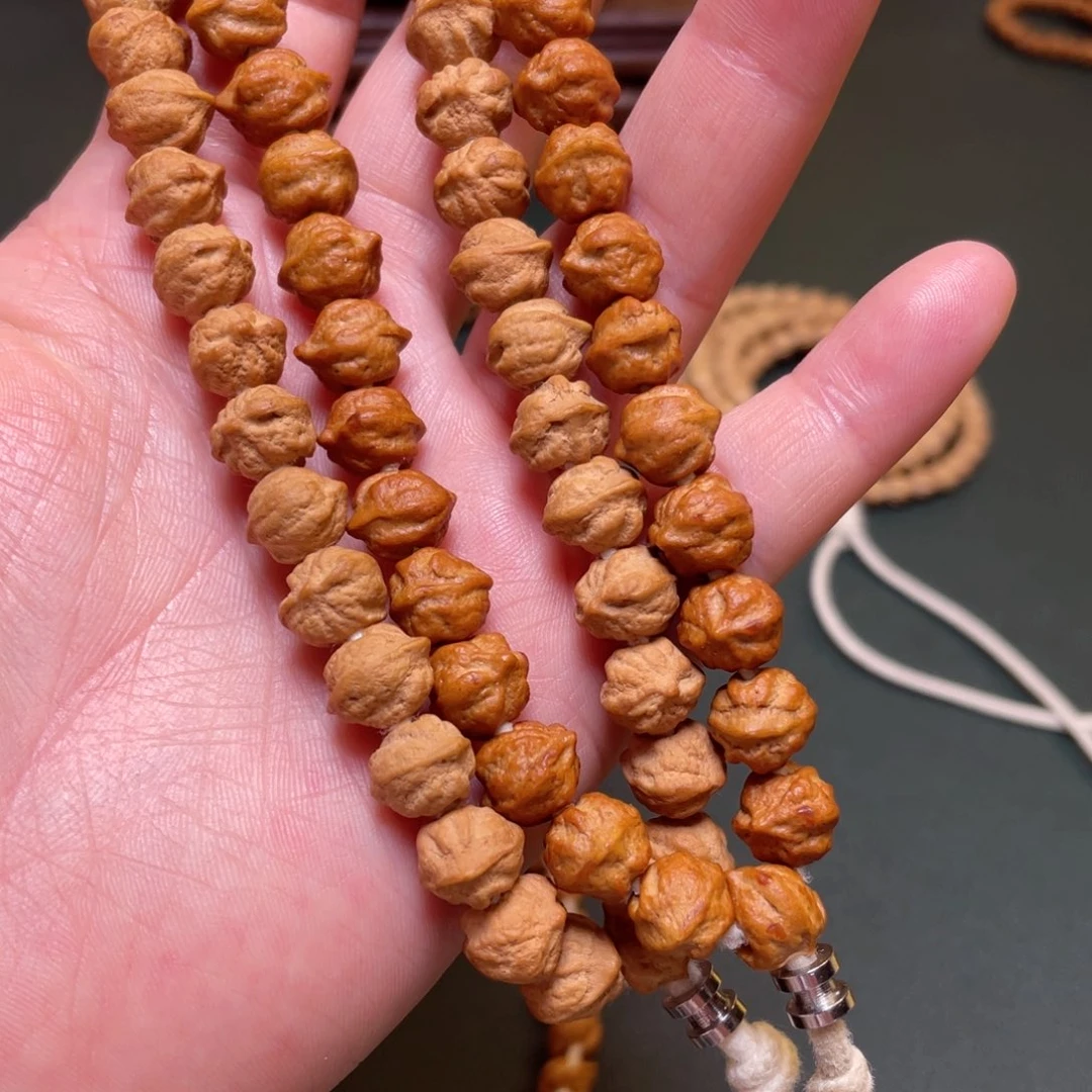 柏香籽/百香籽吊坠白牙横打手持