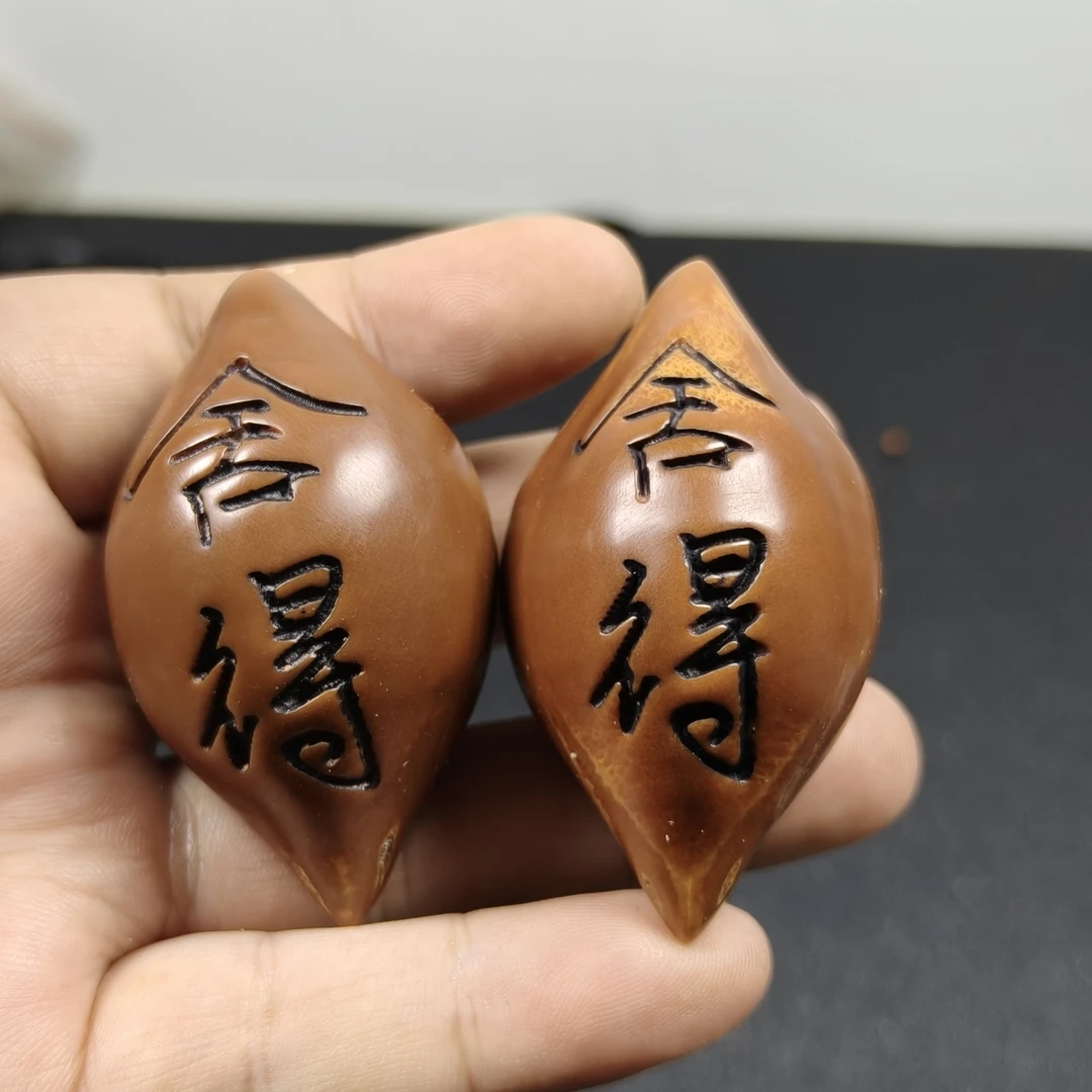 橄榄核雕舍得字体精美手把件独特设计文玩好物尺寸34x50左右