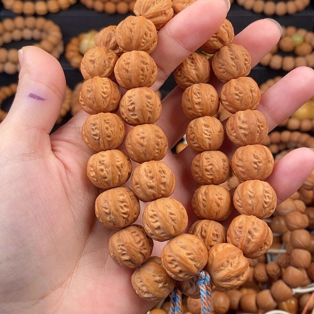 奈***雪猴头核桃手串二等八棱50