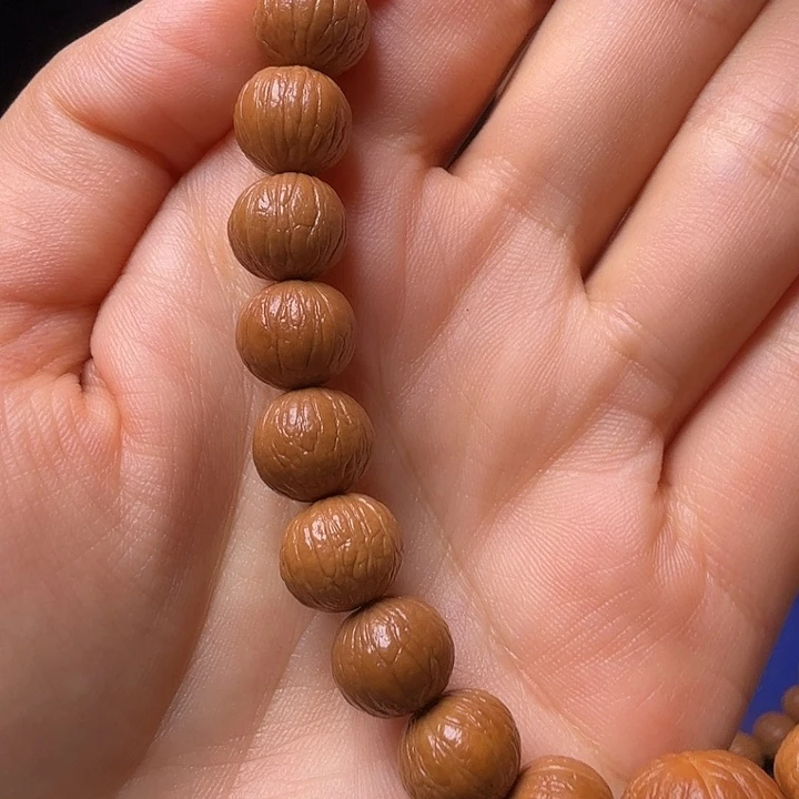 L***.猴头核桃手串凤羽