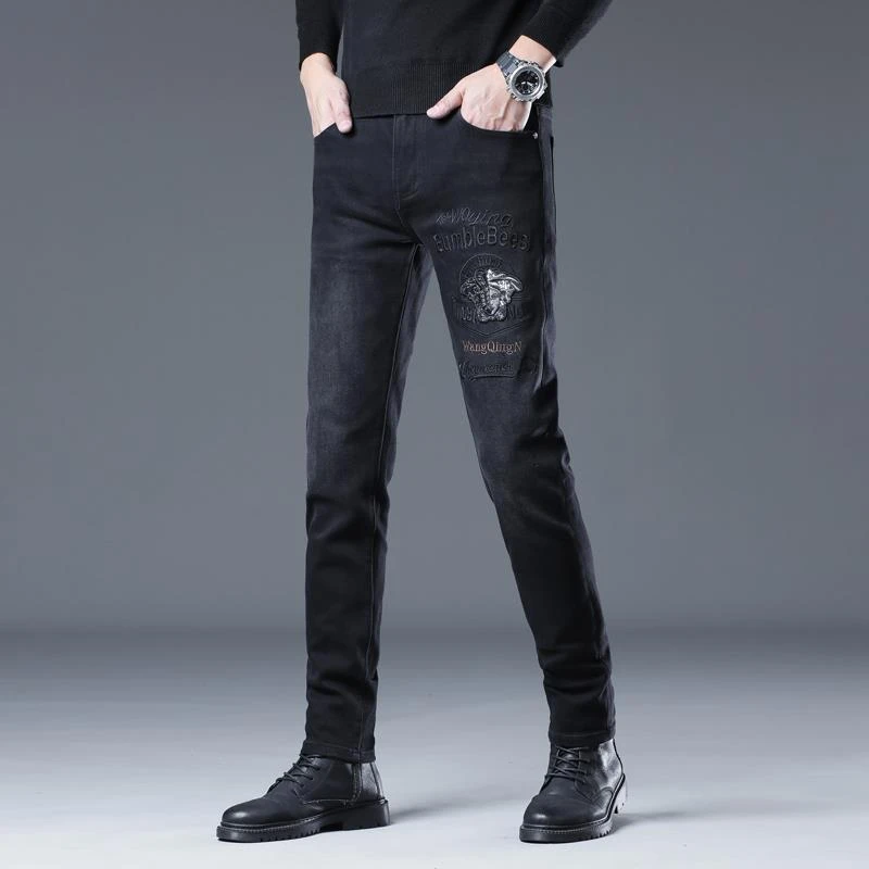 高端欧货黑色牛仔裤男美杜莎刺绣烫钻印花休闲修身小脚百搭长裤子