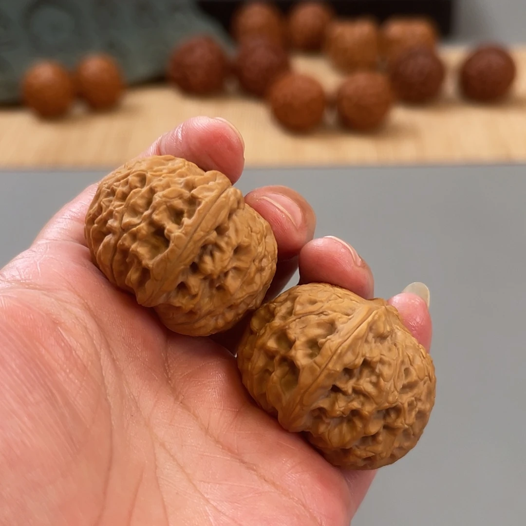 桃核把件39×39尺龙眼元宝XM3329