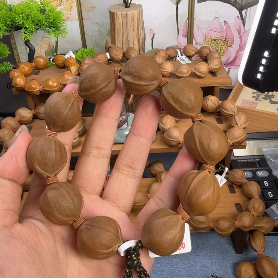 A****手串/手链橄榄核23*26梅林铁核