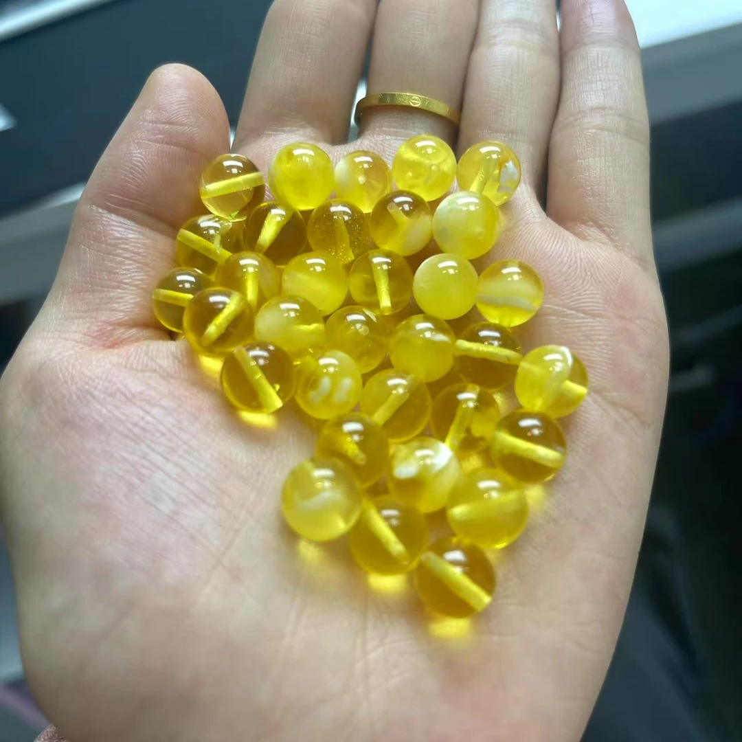 心选珠宝 琥珀蜜蜡单珠 个别珠子有微瑕 介意勿拍 多样性随机发