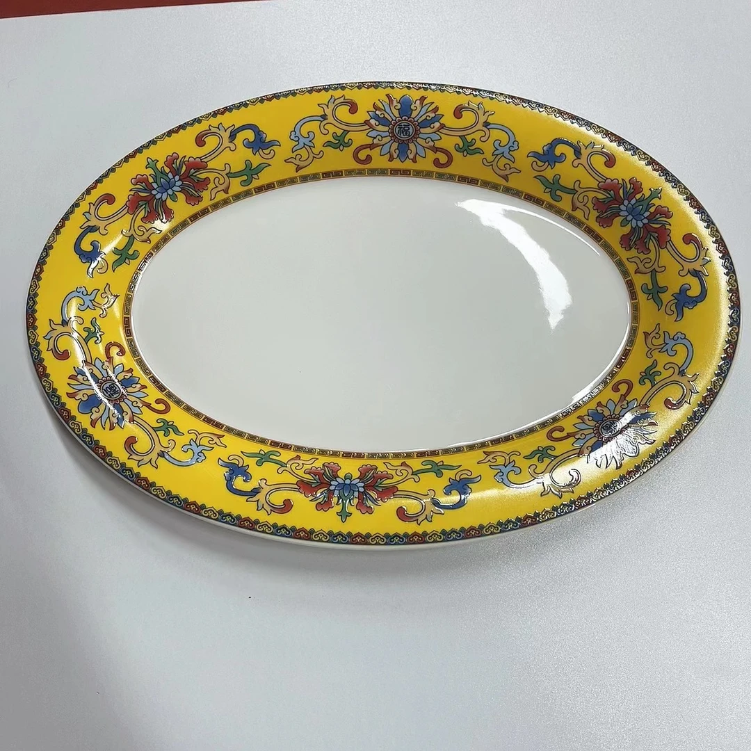 珐琅彩黄色陶瓷鱼盘