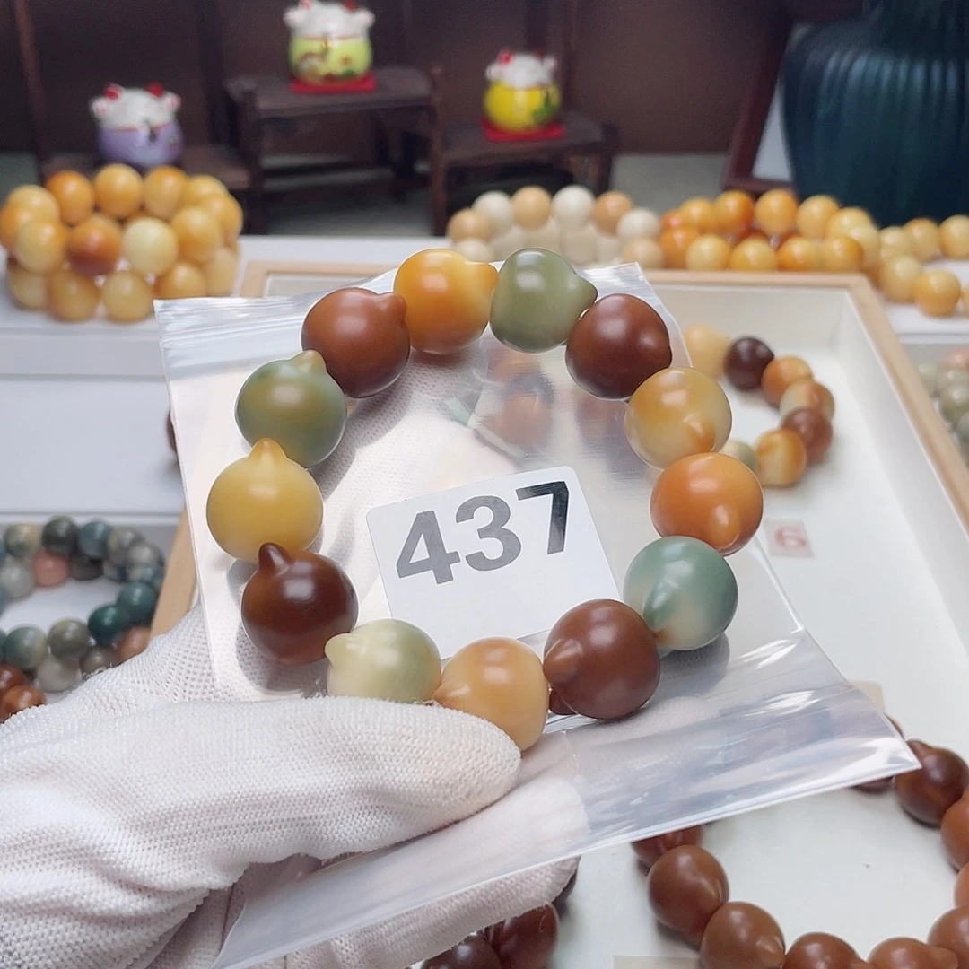 菩提根/象牙果手串辣****绣猫头手串默认瑕疵