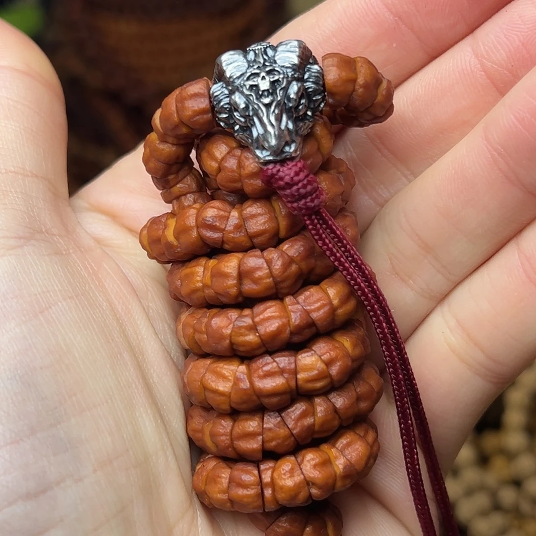 阿***荣柏香籽/百香籽吊坠