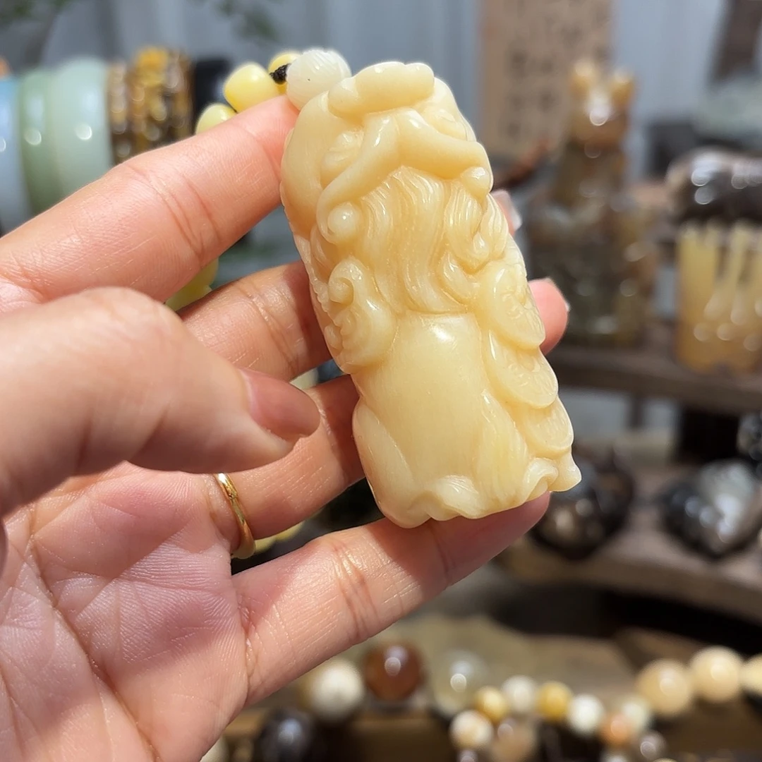 豆***芽非金属驼骨手把件