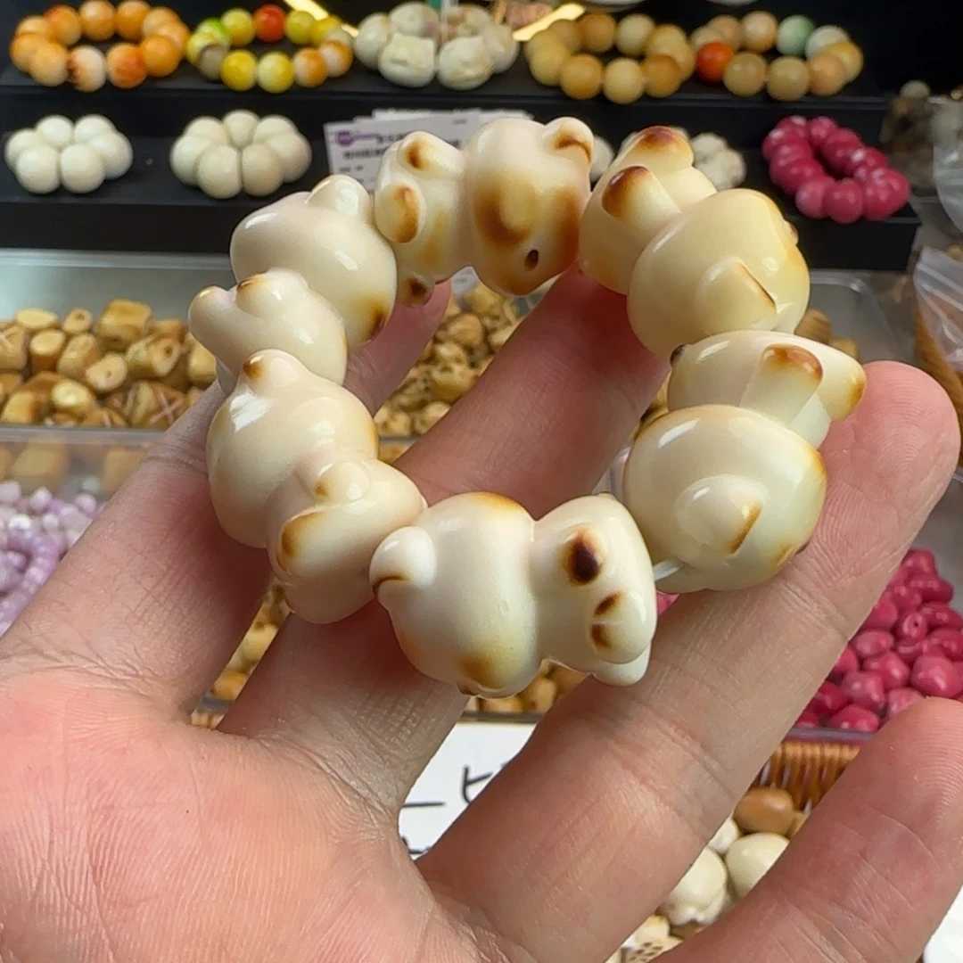 菩提根/象牙果手串微瑕炭烤小熊手捻1个