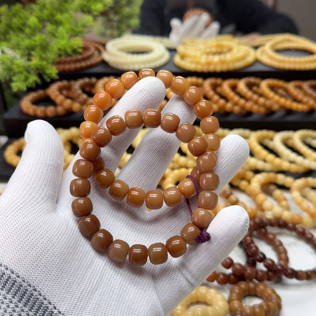 菩提根/象牙果手串10*11微瑕 5年