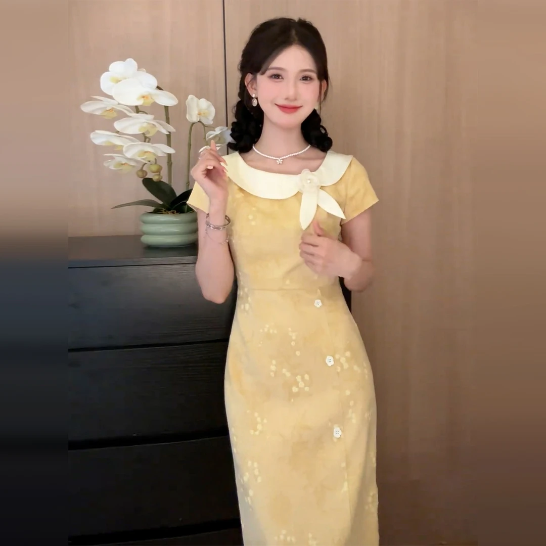 复古黄色蝴蝶结连衣裙子女夏2025新款爆款小众设计感修身长裙4996