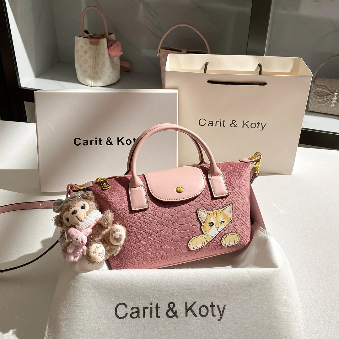 CARIT KOTY粉色秋冬复古斜挎包包女2025新款丝绒珑骧包通勤手提包