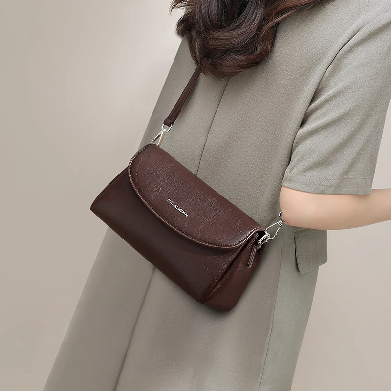 包包2025新款女包单肩斜挎包高级感休闲复古通勤小包织物