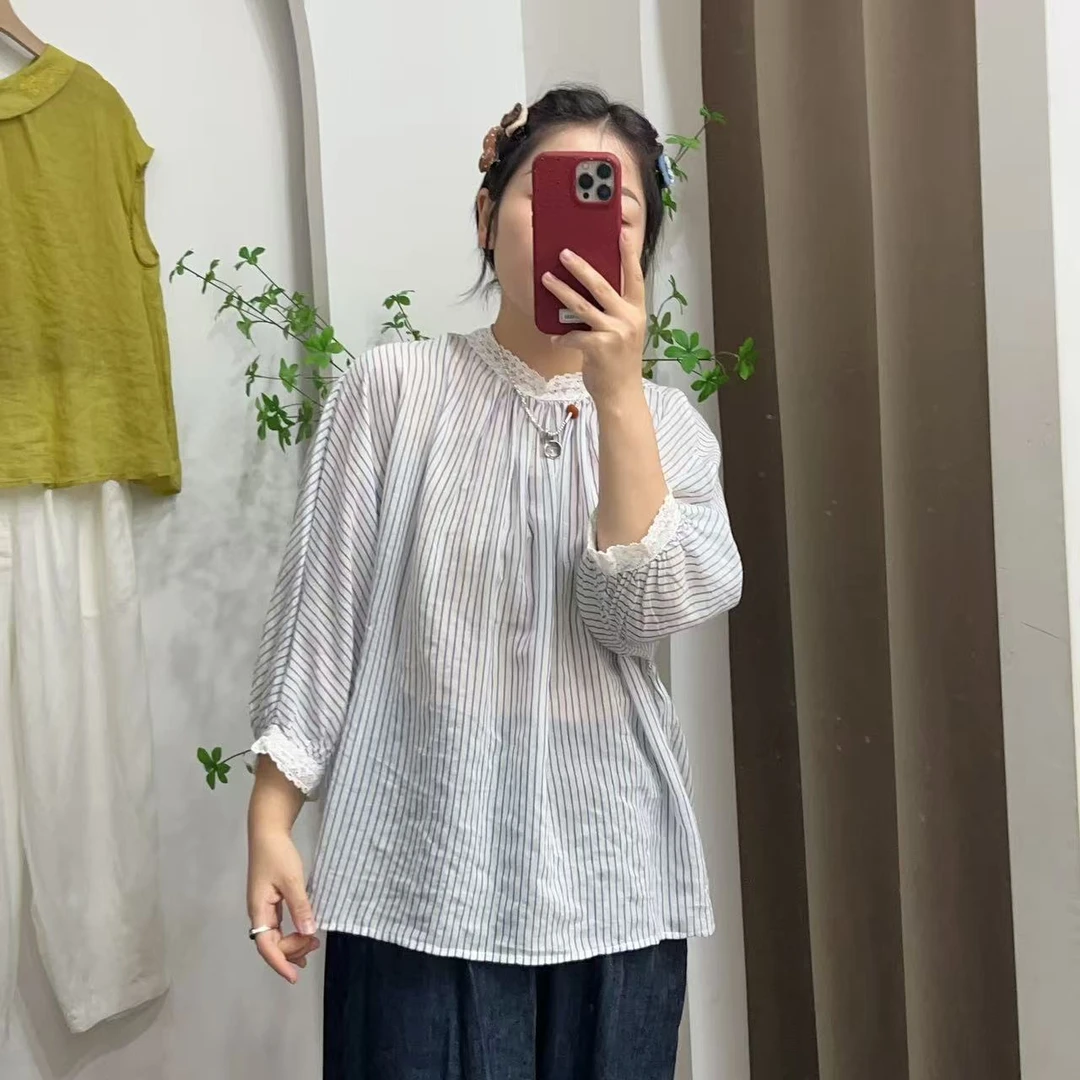 别出新裁22127日单花边蕾丝拼接圆领条纹衬衣     衣长61