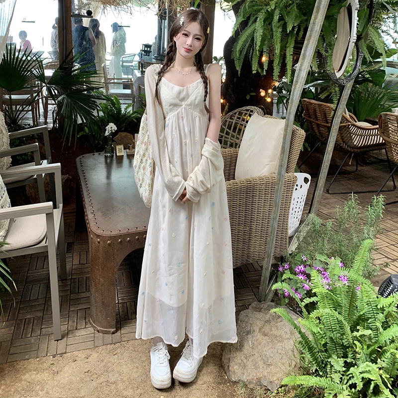 ~海边度假v领碎花吊带大码连衣裙子春夏2025新款法式沙滩长裙